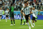 Messi và Rojo đưa Argentina vào vòng 1/8