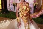 Vợ đại gia đeo 70 chiếc vòng vàng trong ngày cưới