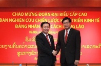 Trưởng Ban Kinh tế Trung ương hội đàm với nguyên Thủ tướng Lào