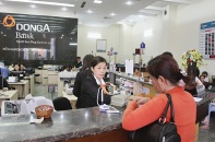 Bán nợ càng nhiều, lợi nhuận ngân hàng càng giảm