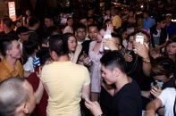 Mr. Đàm tình cảm cài áo cho Hà Hồ
