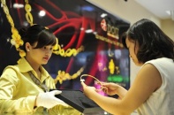 Giá vàng "ngóng tin" từ Fed