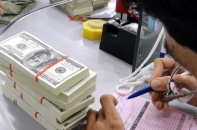 NHNN sẽ xử nghiêm các ngân hàng lách trần lãi suất tiền gửi bằng USD