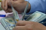 Giá đồng USD giảm xuống đáy gần 2 tháng