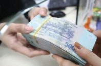 "Ẩn nấp" trong tín dụng tiêu dùng, vốn vào bất động sản vẫn bị siết