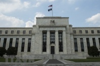 Căng thẳng thương mại có thể làm chậm tiến trình nâng lãi suất của Fed