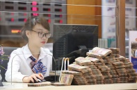 Ngân hàng mạnh tay chia cổ tức, phát hành cổ phiếu thưởng để kịp tăng vốn đáp ứng Basel II