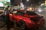 Lái xe BMW 7 tỷ "làm loạn" trên phố khai gì với công an?