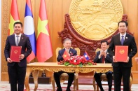 Việt Nam - Lào ký kết bản ghi nhớ phát triển chuỗi liên kết công nghiệp