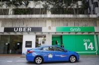 Doanh thu của “đại gia” taxi Singapore giảm hơn một nửa tại Việt Nam