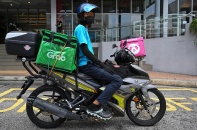 Grab vẫn thua lỗ