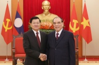 Nguyên Tổng Bí thư Nông Đức Mạnh tiếp Tổng Bí thư, Chủ tịch nước Lào thăm Việt Nam