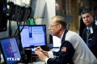 Fed giữ nguyên lãi suất, S&P lần đầu chạm mốc lịch sử 7.000 điểm