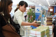 Cao điểm M&A ngân hàng: Chờ thương vụ tự nguyện 