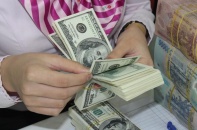 Điều chỉnh tỷ giá tác động tích cực đến cổ phiếu