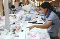 Cổ phiếu dệt may không dễ trở thành "hàng nóng"