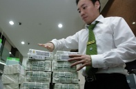 Chưa thể chấm dứt tín dụng ngoại tệ