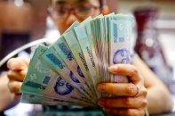 Ngân hàng Nhà nước mạnh tay bãi bỏ giấy phép con