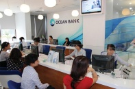 Gỡ nợ xấu, M&A ngân hàng bùng nổ