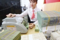 Tín dụng tăng có kiểm soát, nợ xấu dần chuyển động