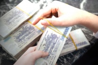 Nguy cơ bị phạt cổ tức, ngân hàng dồn dập xóa nợ tại VAMC