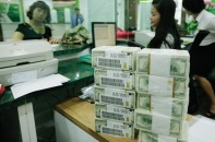 Chịu áp lực từ Fed, tỷ giá nổi sóng nhẹ