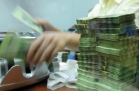 Ngân hàng cơ cấu lại nợ để chặn nợ xấu