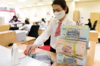 Tín dụng “thời chiến” và vết hằn bánh xe đổ