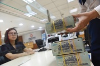 Lợi nhuận ngân hàng gần tới đích cả năm