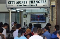 Singapore siết chặt chính sách tiền tệ