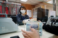 Lợi nhuận thực và chuyện “hoãn binh” nợ xấu 