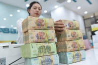 Tín dụng khó chảy mạnh do áp lực lãi vay cao