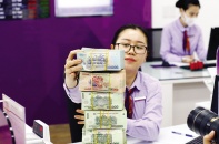 Mừng lãi suất, lo khó vay