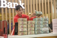 Chính sách tiền tệ thêm nới lỏng, áp lực với tỷ giá càng tăng
