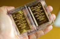 USD hạ nhiệt, vàng đi ngang chờ đợi quyết định của Fed