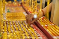 Vàng quay đầu tăng, Ngân hàng Nhà nước hạ tỷ giá trung tâm 