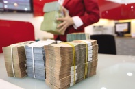    Tín dụng chậm lại, nợ xấu gia tăng, lãi vay có thể ngược chiều thế giới