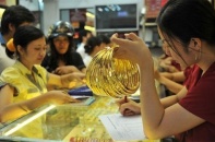 Vàng thế giới lấy lại ngưỡng 2.000 USD/ounce, vàng trong nước ngược chiều, giảm nhẹ