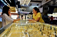 Vàng lấy lại đà tăng hơn 16 USD/ounce