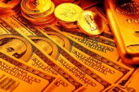 Vàng bất ngờ tăng, nhưng vẫn dưới ngưỡng 1.900 USD/ounce