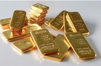 Vàng thế giới tăng tiếp phiên đầu tuần, USD nhích nhẹ