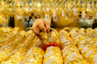 Vàng tiến sát ngưỡng 3.000 USD/ounce
