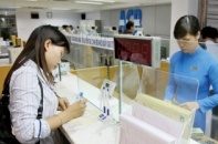 Sự thực bất ngờ thưởng Tết 2014 khối ngân hàng