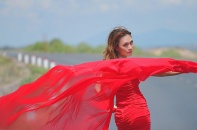Mỹ Tâm diện đầm đỏ rực cực "sexy" trong MV mới