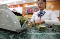 Tiền đồng sẽ còn mất giá nhẹ?