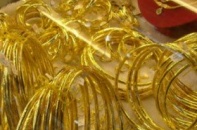 Vàng bật tăng khi Trung Quốc nới lỏng tiền tệ