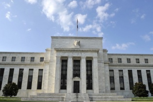 Fed hạ dự báo tăng trưởng GDP của nền kinh tế Mỹ