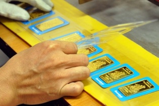 Giá vàng xuống đáy trong vòng một tháng qua