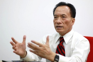 TS. Nguyễn Trí Hiếu: Bỏ trần lãi suất, muộn còn hơn không