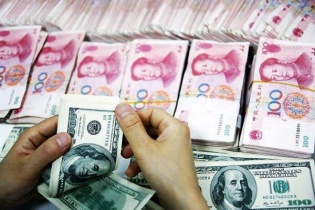 Đồng USD bị “thất sủng” trong một số giao dịch quốc tế